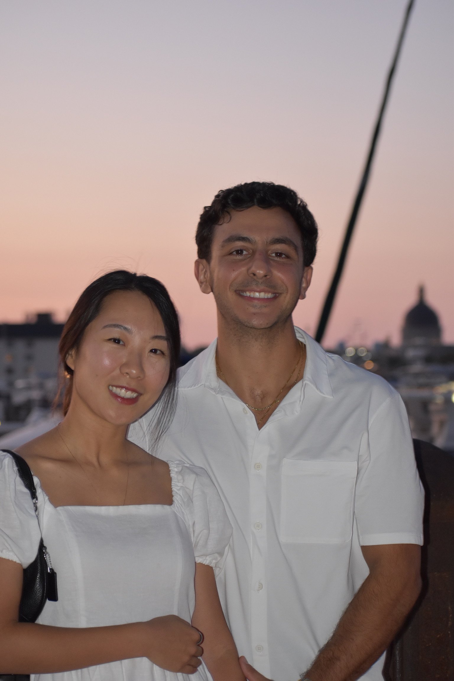 Alex Psichas with his wife at sunset